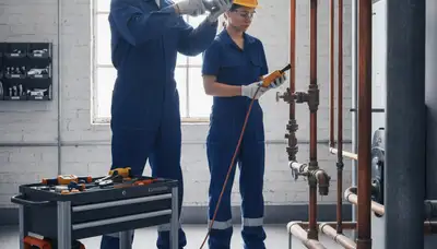 Boise, ID plumber repairing a home pipe to prevent leaks and freeze damage
